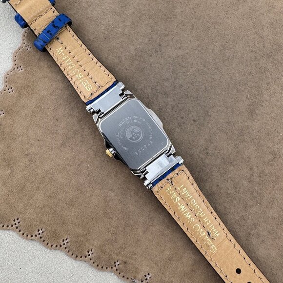 Vintage Seiko SQ 50 Tourneau watch for women features a two-tone Case Blue Strap main image 6